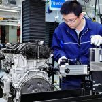 a typical China worker in partner company manufacturing for the American market